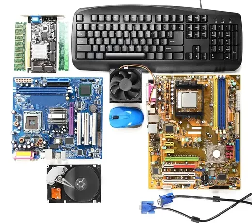 Sell Computer Equipments in Bulk to MS Scrap Buyers in Hyderabad to efficiently dispose of old hardware while ensuring sustainability and value recovery. The image displays various computer components, including a keyboard, motherboard, cooling fan, hard drive, mouse, and cables. These components appear to be used or scrap items, suitable for resale or recycling.